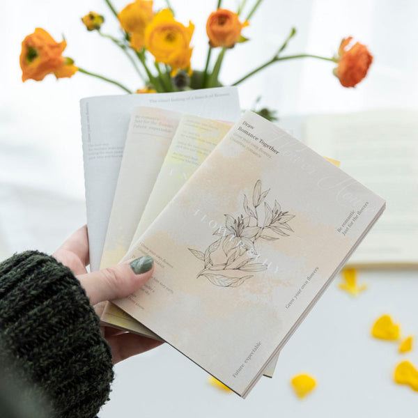 Papieren bloemen huis serie notitieboek